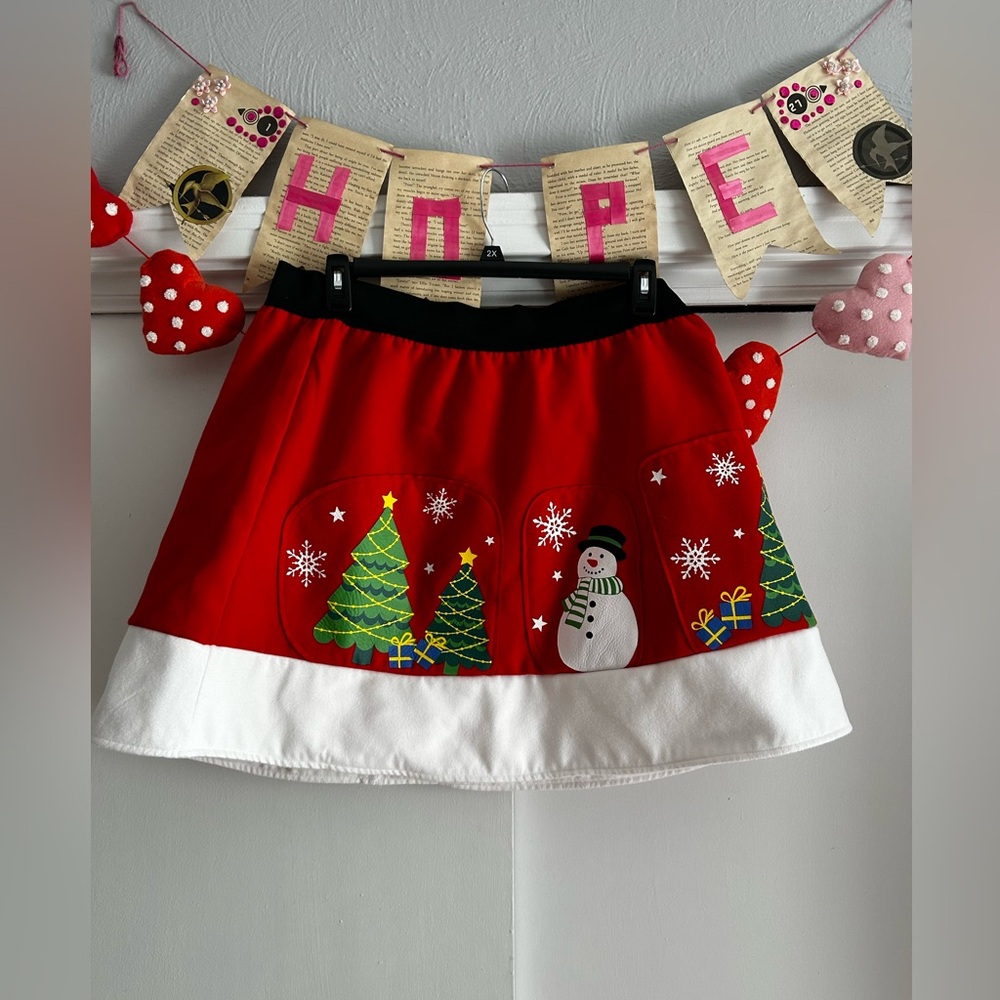 Festive Red and White Skirt with Snowman Design